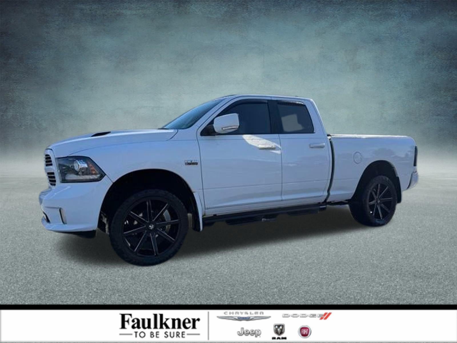 2014 RAM 1500 4WD Quad Cab 6.4 Ft Box Sport